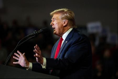 FILE PHOTO: Republican presidential candidate and former U.S. President Donald Trump speaks as he holds a campaign rally at Coastal Carolina University ahead of the South Carolina Republican presidential primary in Conway, South Carolina, U.S., February 10, 2024. REUTERS/Sam Wolfe/File Photo
