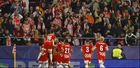 Soccer Football - Champions League - Girona v Slovan Bratislava - Estadi Montilivi, Girona, Spain - October 22, 2024 Girona players celebrate after Juanpe scores their second goal REUTERS/Albert Gea