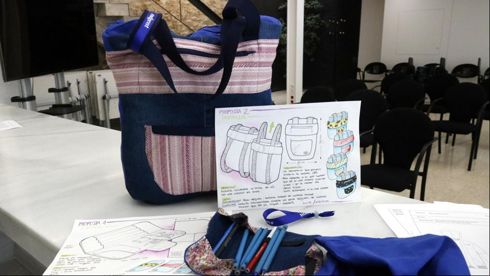 Crean una linea de merchandising de la UdG con ropa reciclada