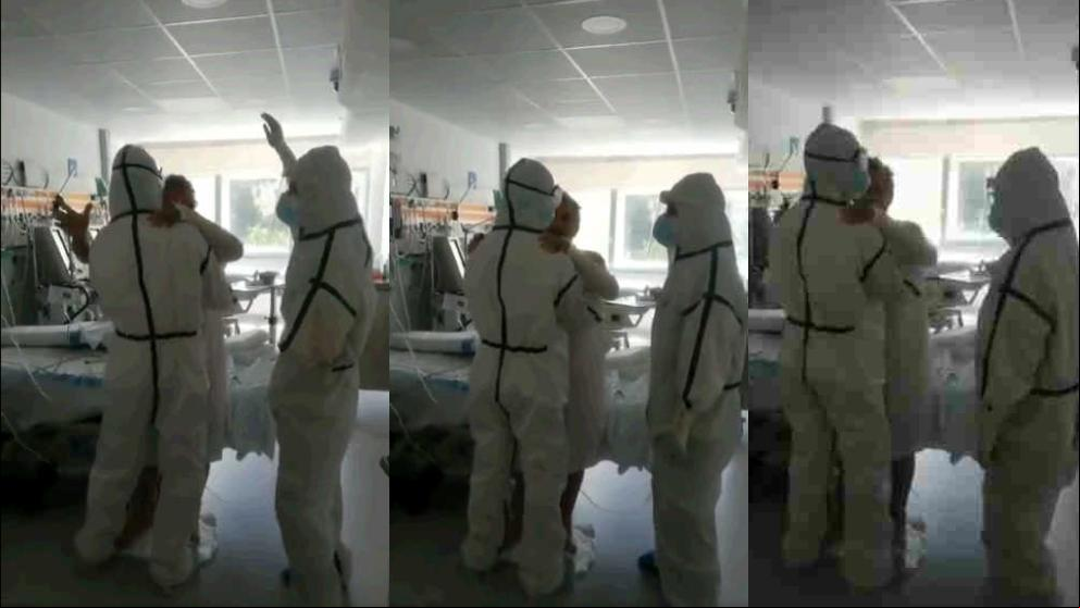 Un sanitario saca a bailar a un paciente de coronavirus que llevaba un mes sin moverse